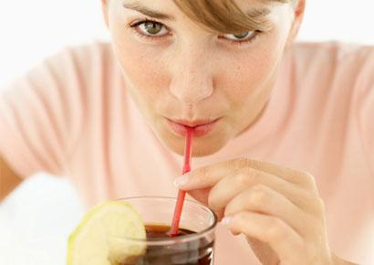woman-drinking-cola-straw-410x290.jpg